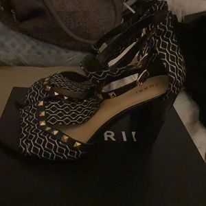 Black and white gently used heels